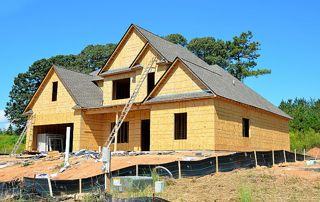 construction de maison clé sur porte